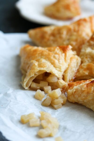 puff pastries with apple on paper