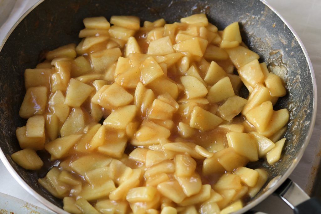 cooked apples in pan