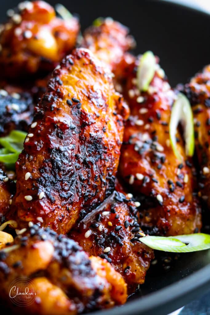 close up of grilled Asian wings 