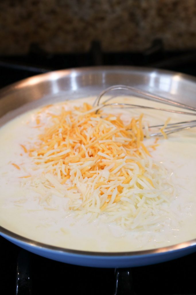 shredded cheese in roux