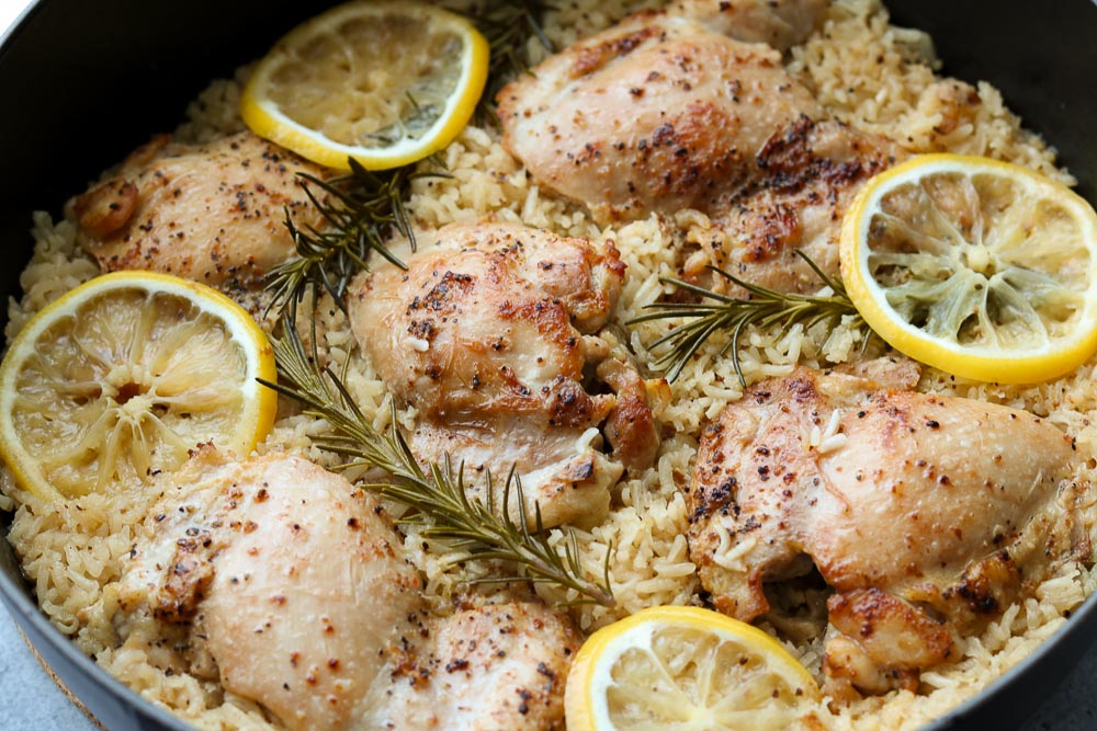 one pan lemon rosemary chicken and rice in pan cooked
