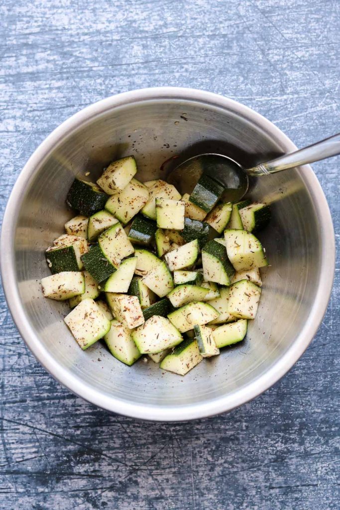raw zucchini tossed in olive oil and Za'atar