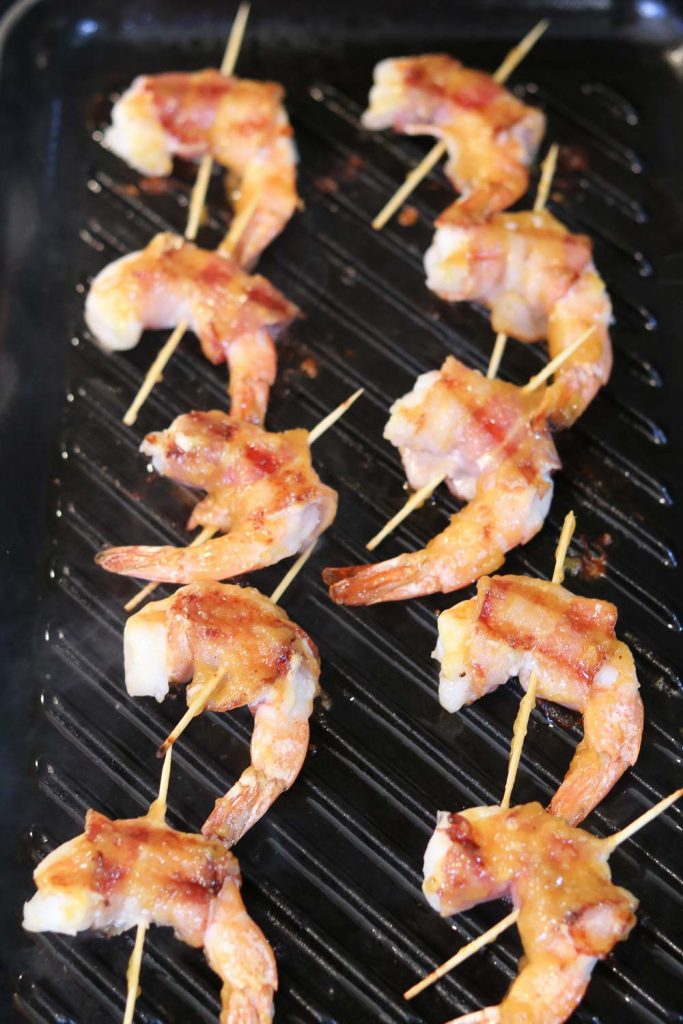 chutney glazed bacon wrapped shrimp almost done 