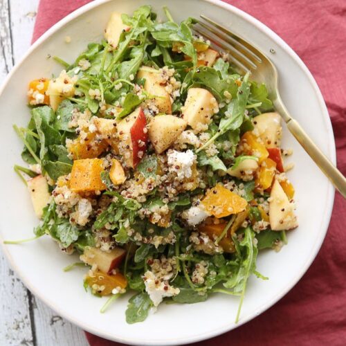 roasted golden beet quinoa salad on plate with fork
