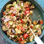 square size balsamic roasted vegetable grain salad with serving spoon