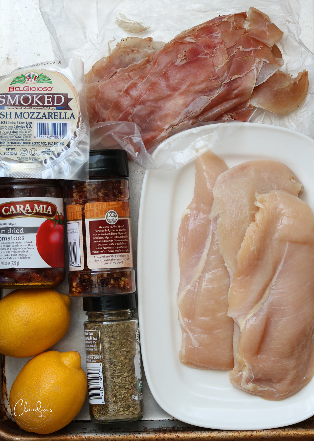 ingredients for grilled chicken involtini on half sheet