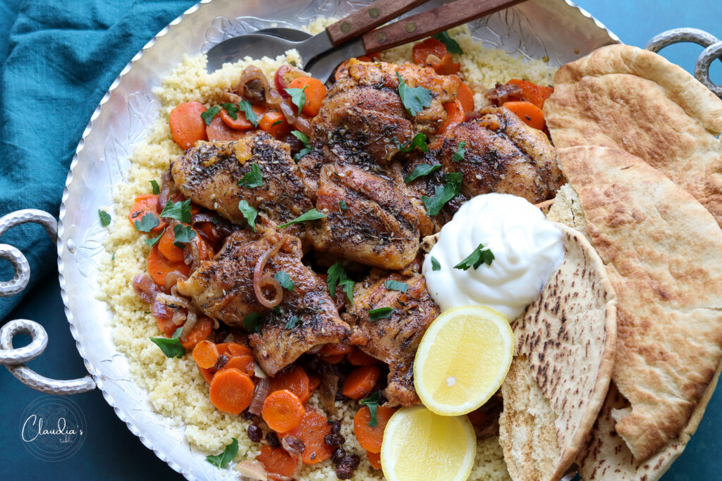 horizontal one pan chicken zaatar with carrots and currants