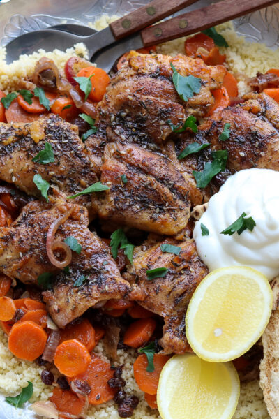 horizontal one pan chicken zaatar with carrots and currants