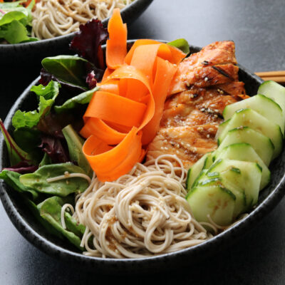 horizontal soba noodle teriyaki chicken salad bowls