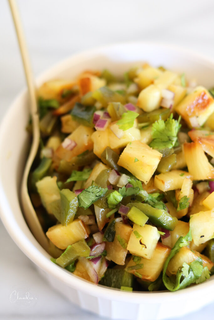 grilled pineapple jalapeno salad in white bowl 