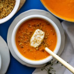carrot and sweet potato soup with goat cheese and bread crumbs