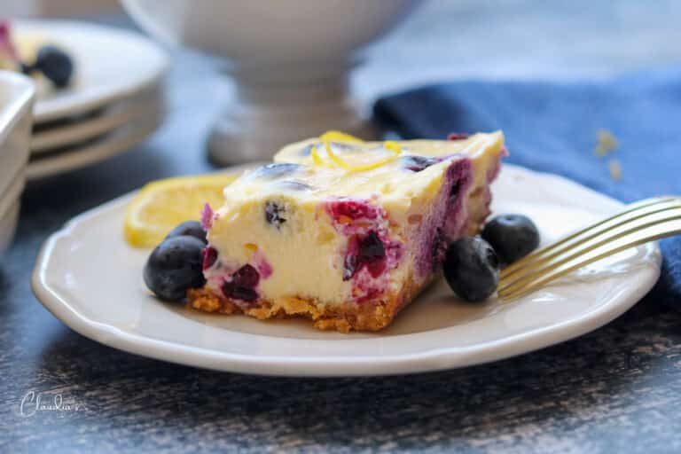 horizontal image of blueberry cheesecake bars