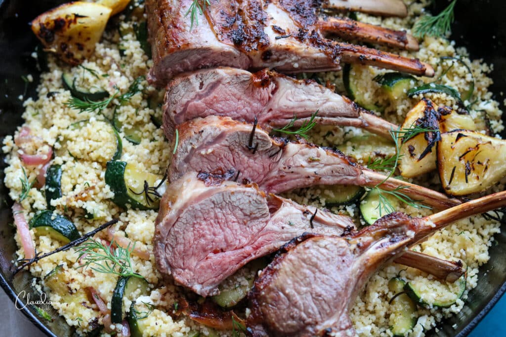 horizontal image of rack of lamb with couscous