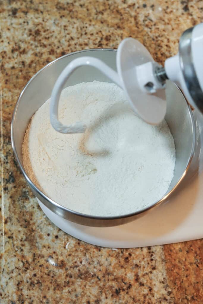dry ingredients in stand mixer for pizza