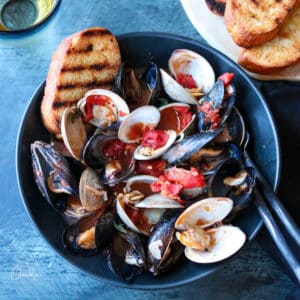 mussels and clams in tomato broth