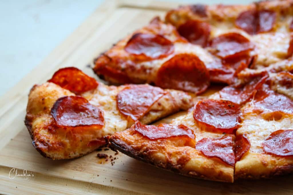 side slice view of cast iron pan pizza