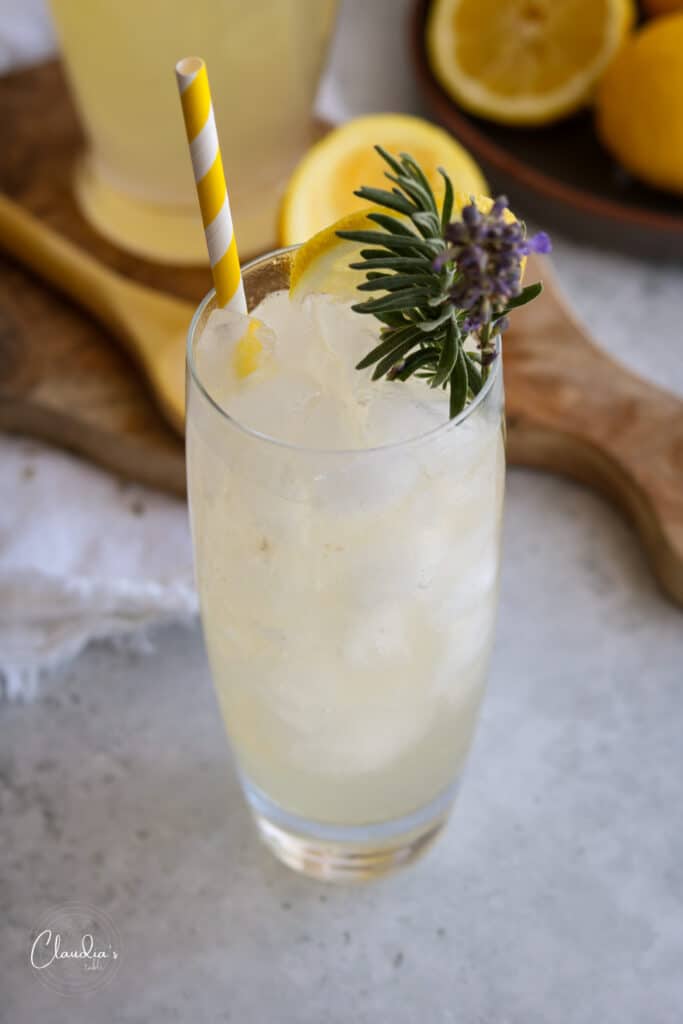 lavender lemonade with ice and lavender garnish 