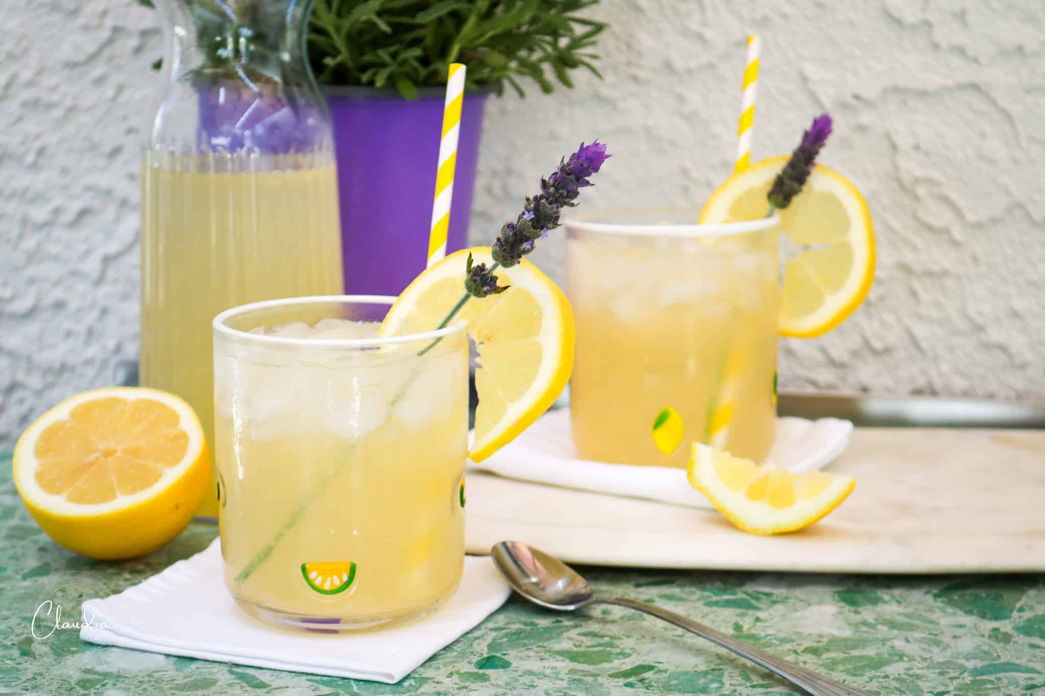 Two glasses of lavender lemonade with homemade lavender syrup