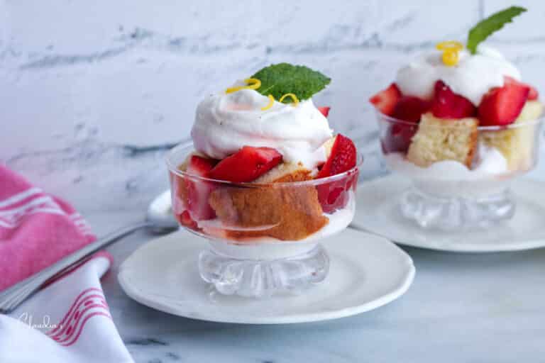 limoncello strawberries with whipped cream, poundcake and mint garnish