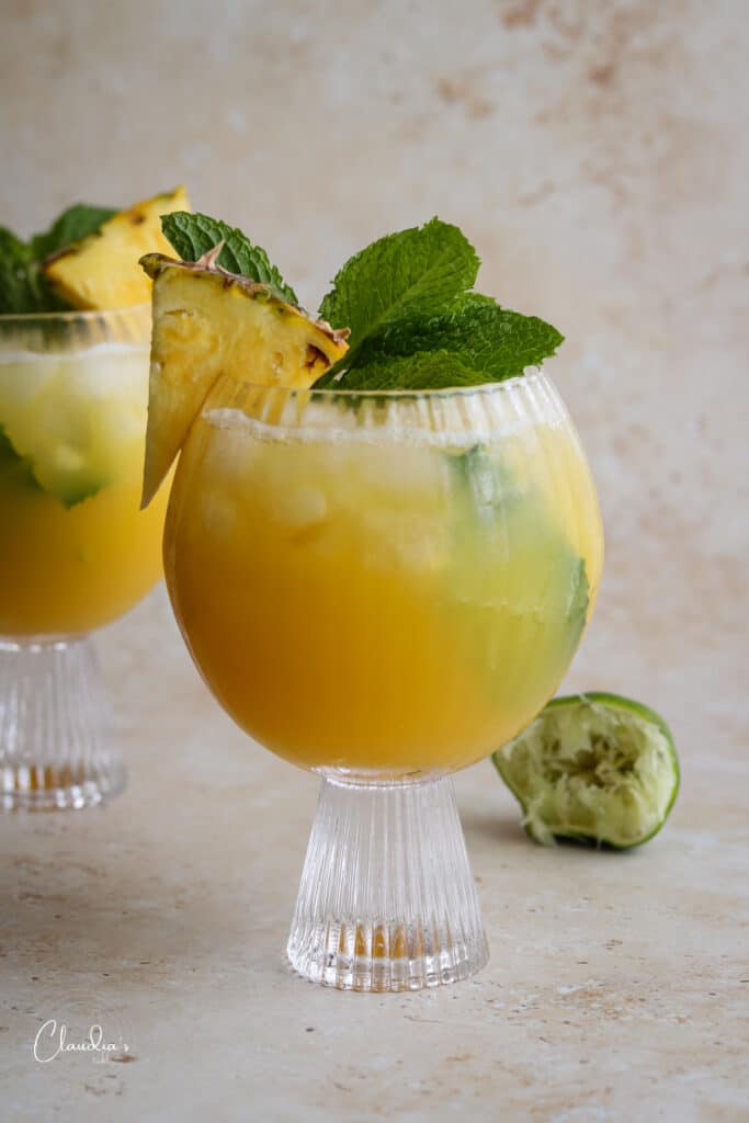 healthy tropical mocktail with fresh mint and pineapple