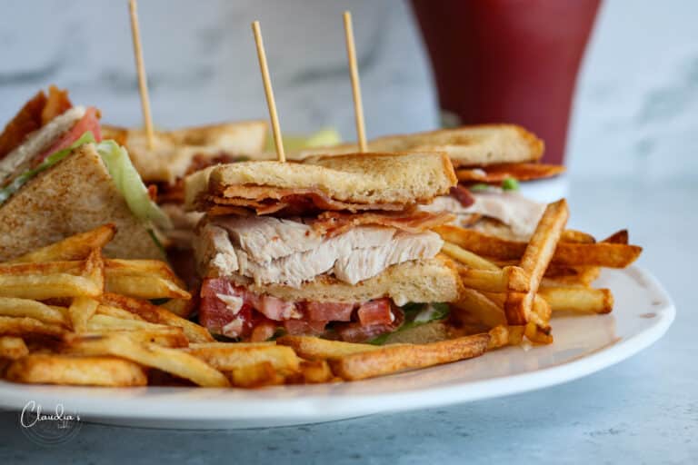 classic turkey club sandwich with french fries