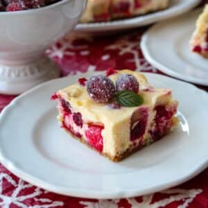 cranberry orange cheesecake bars square image