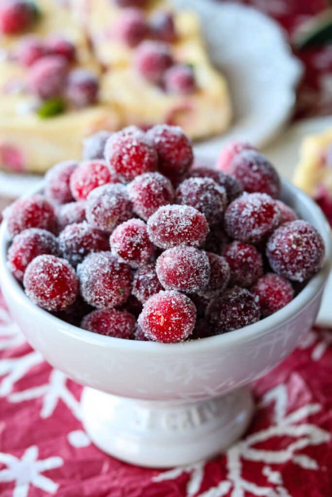 a bowl of sugared cranberries 