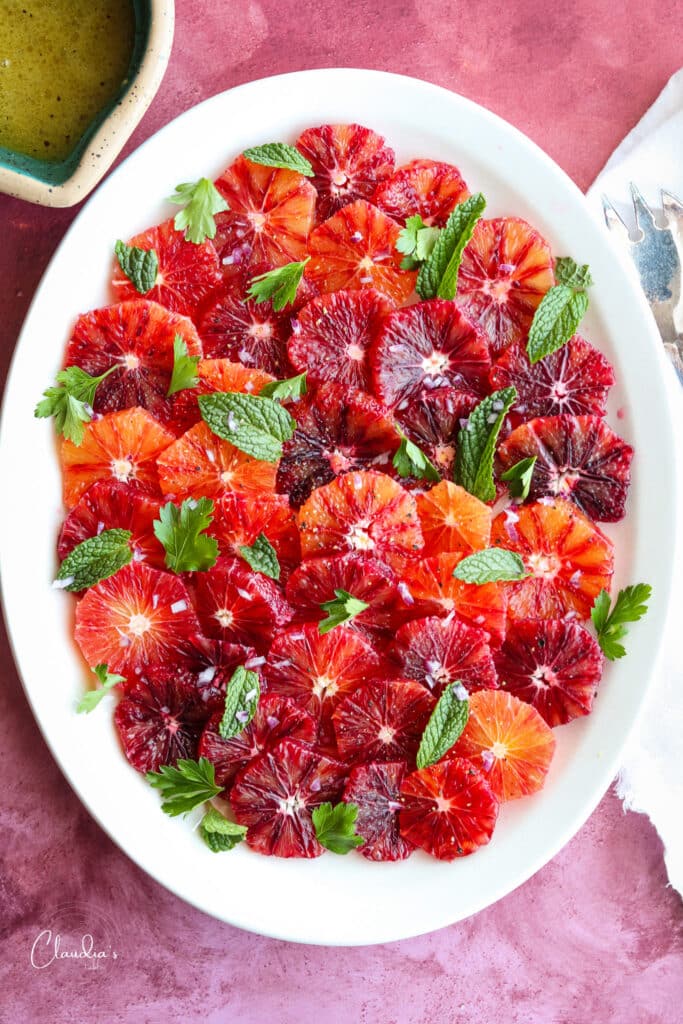 Top view of blood orange salad with herbs 