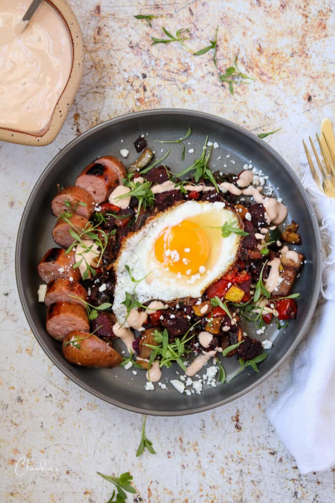 chipotle crema on vegetable breakfast hash 