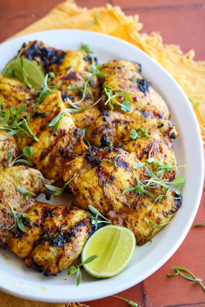 close up of grilled citrus marinated chicken thighs